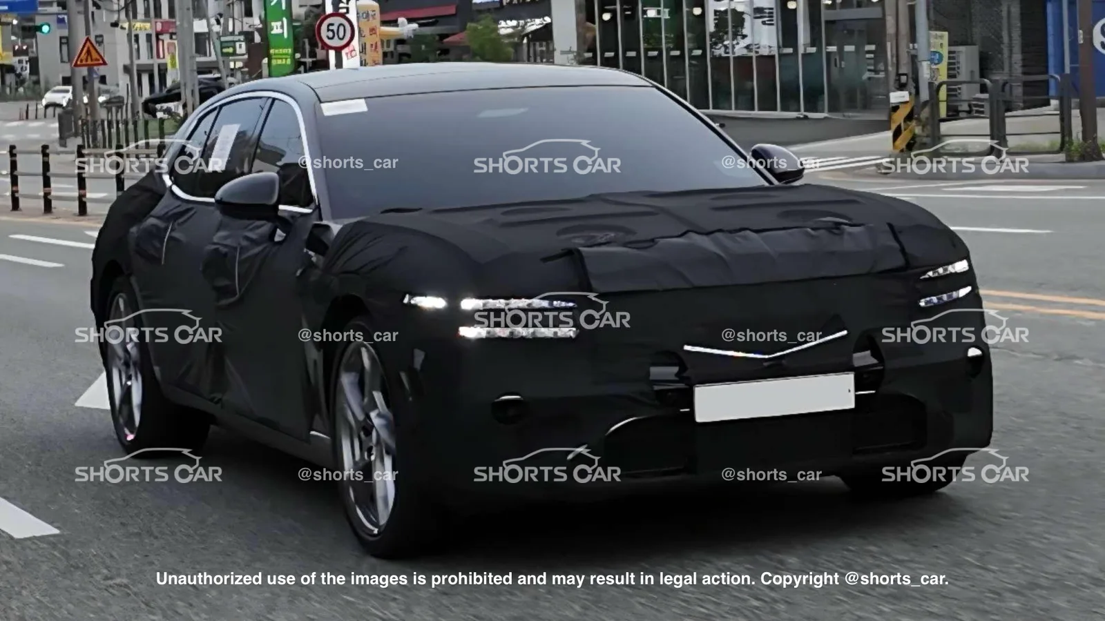 Genesis G90 Facelift Prototype Caught on Camera Featuring Illuminated Crest Grille