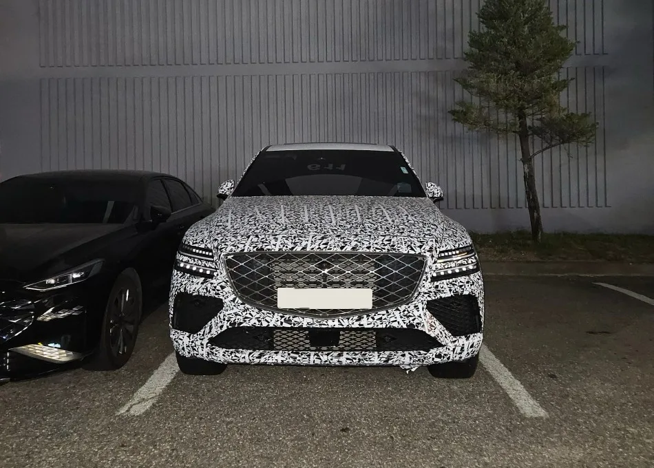 Genesis GV80 Coupe Hybrid Spied Testing With Prototype Exhausts