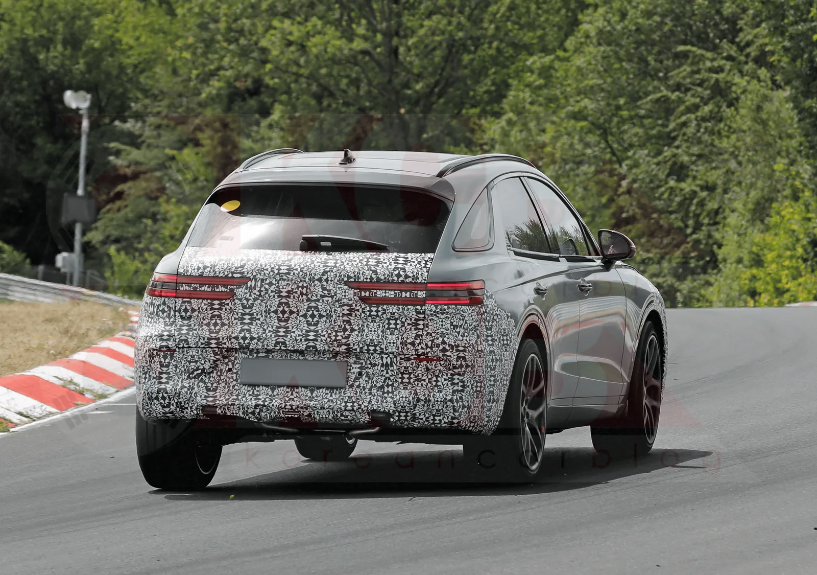 Genesis GV70 Hybrid Sheds Camouflage for High Performance Testing at the Nürburgring