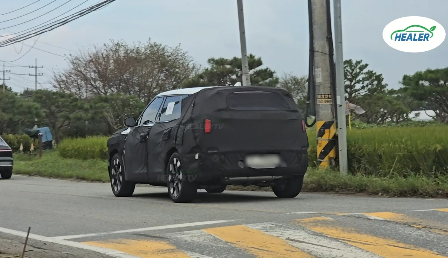 Next-Gen Kia Sportage NQ6 Prototype Spotted with Production Lights